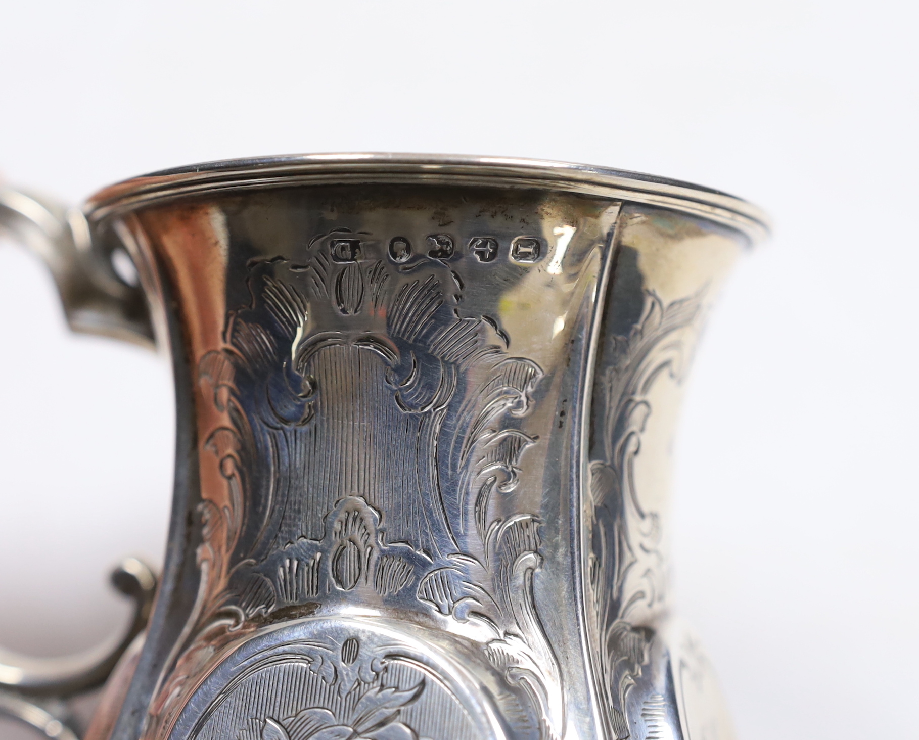 A Victorian engraved silver christening mug, George Unite?, Birmingham, 1857, 10.2cm.